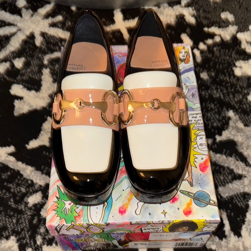 Jeffrey Campbell Black and White Loafers with Gold Accent